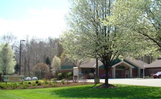 Building with Spring-blooming trees in front
